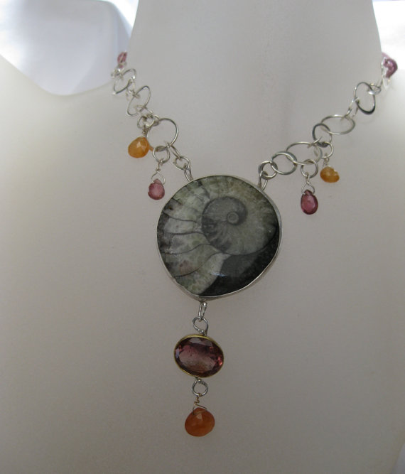 Pick #6Wanga Talisman Necklace with Pink Tourmalines Spessartite Garnets (for good luck when given as a gift, constant affection and loyalty) and an Ammonite fossil (the unending spiral of life - holds the power of wisdom).