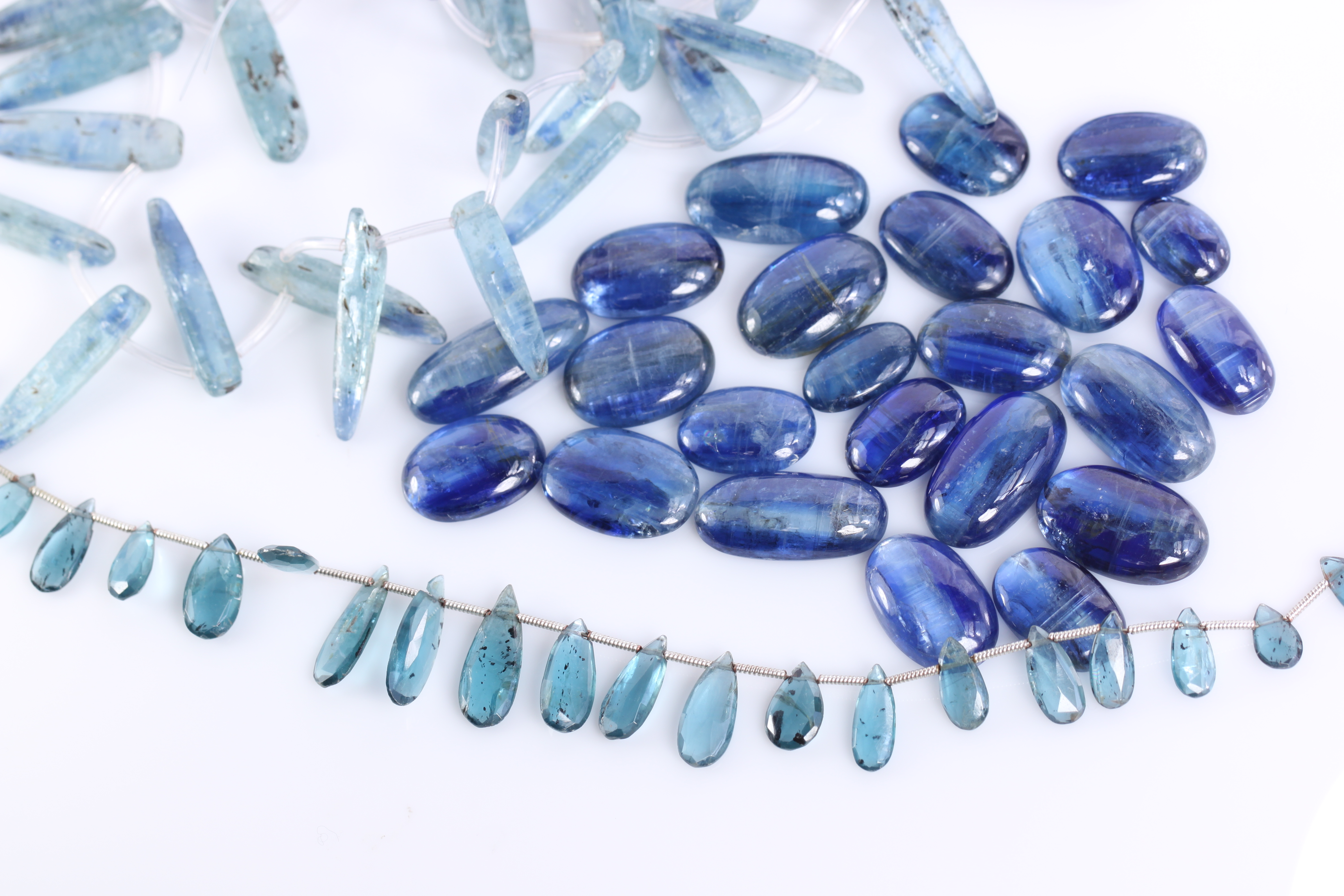 Blue Kyanite: Rough, Oval Cabochons & Briolettes